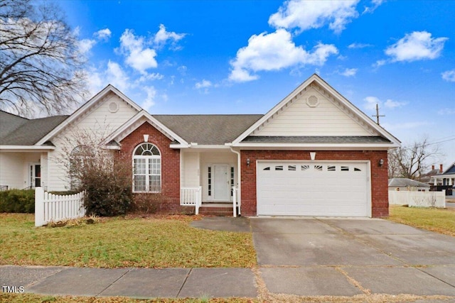 ranch-style house with a garage and a front yard