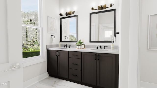 4081 Elk Creek Ln Unit 07, Raleigh, NC 27612 - bathroom featuring double vanity, marble finish flooring, and plenty of natural light