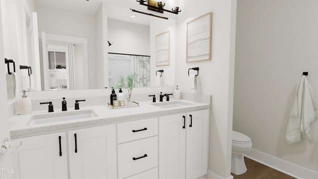 4081 Elk Creek Ln Unit 07, Raleigh, NC 27612 - full bathroom featuring double vanity and wood finished floors