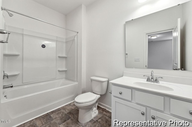 full bath featuring toilet, vanity, baseboards, and shower / bathtub combination