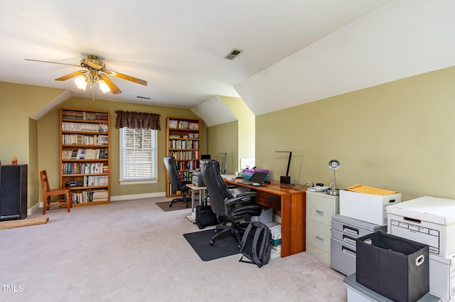 office area with light colored carpet, lofted ceiling, a ceiling fan, and visible vents