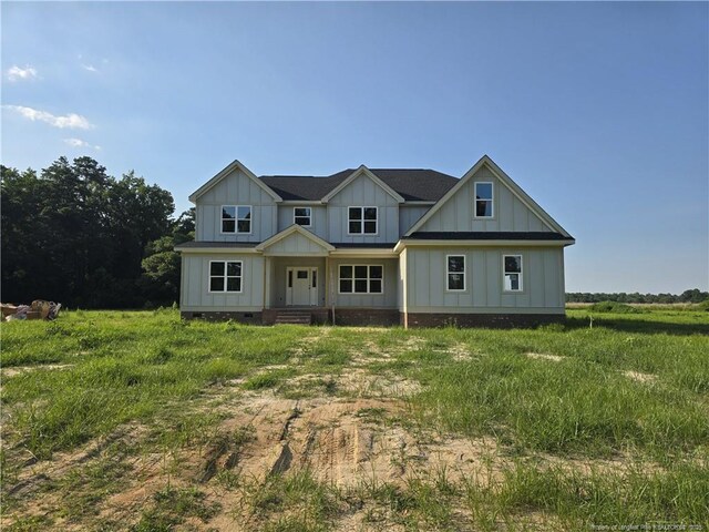 3255 School Rd, Fayetteville, NC 28306 - view of front of property featuring board and batten siding