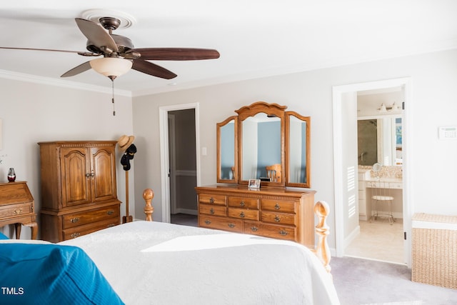 bedroom with connected bathroom, crown molding, light colored carpet, and ceiling fan