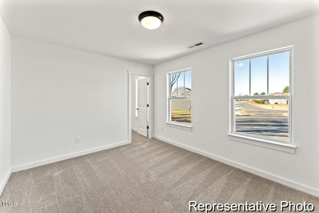 empty room with carpet floors