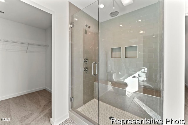 bathroom featuring walk in shower