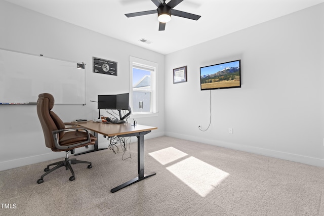 office area with light carpet and ceiling fan