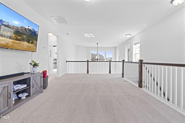 corridor featuring carpet floors