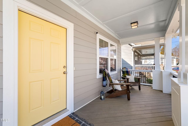 doorway to property with a porch