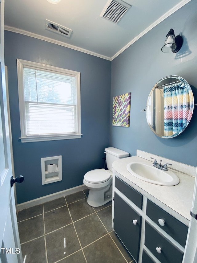 bathroom featuring crown molding, tile patterned floors, toilet, and vanity