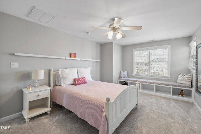 bedroom with carpet floors, visible vents, baseboards, and a ceiling fan