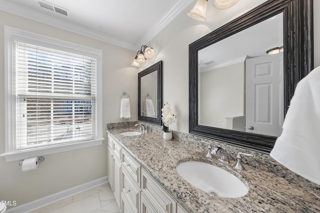 full bath with a sink, visible vents, baseboards, marble finish floor, and ornamental molding