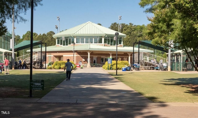 view of community featuring a yard