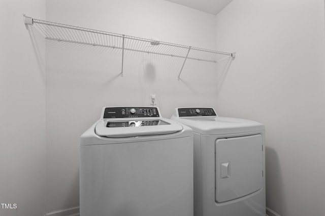 laundry area featuring independent washer and dryer