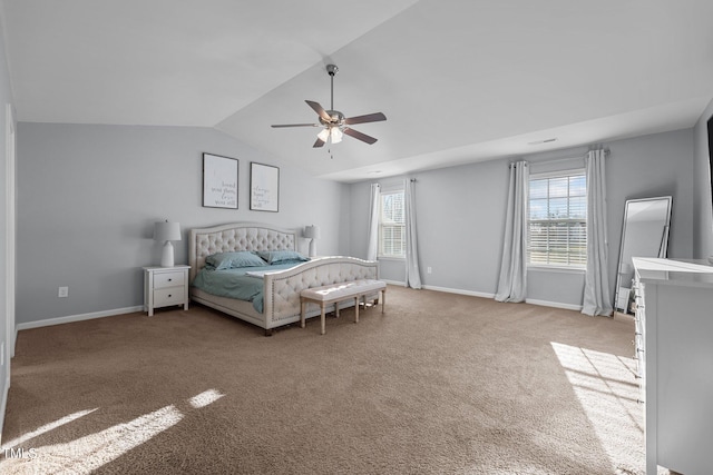 carpeted bedroom with lofted ceiling and ceiling fan