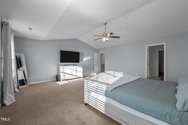 carpeted bedroom featuring vaulted ceiling and ceiling fan