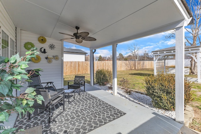 view of patio / terrace featuring ceiling fan