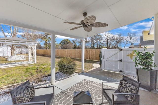 view of patio / terrace featuring a pergola and ceiling fan