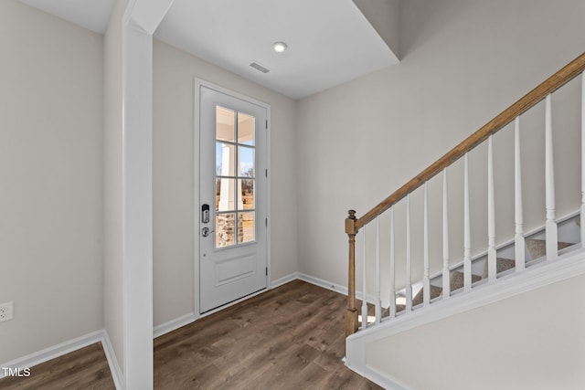 entrance foyer with dark hardwood / wood-style flooring