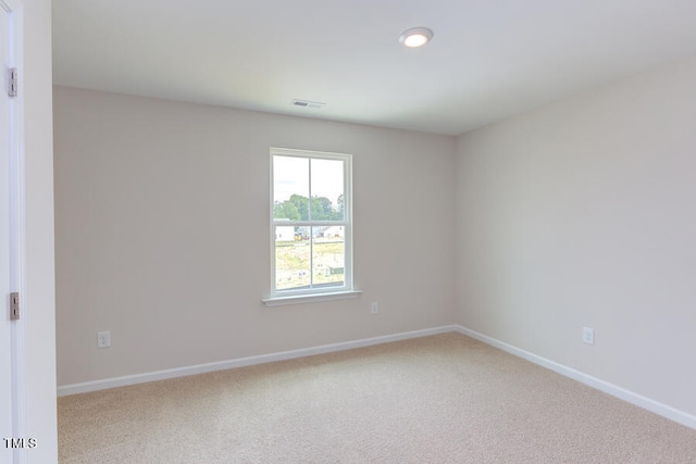 view of carpeted spare room