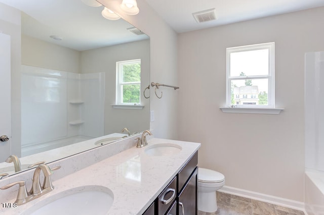 full bathroom featuring vanity, shower / bathtub combination, and toilet