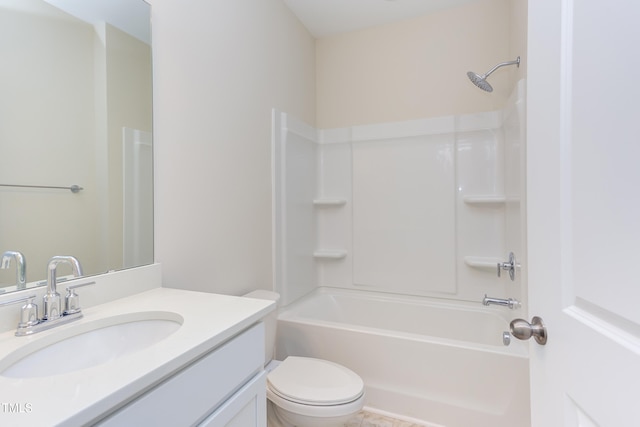 full bathroom featuring shower / bathing tub combination, vanity, and toilet