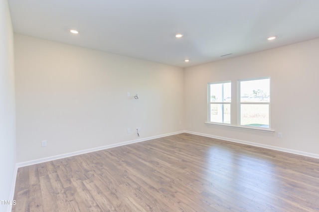 empty room featuring hardwood / wood-style floors