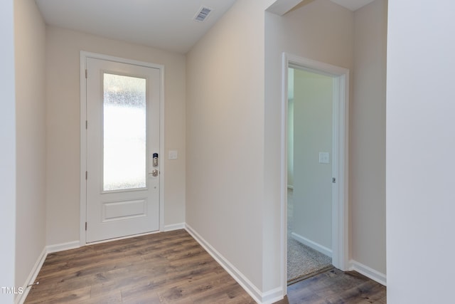 doorway to outside with dark hardwood / wood-style flooring