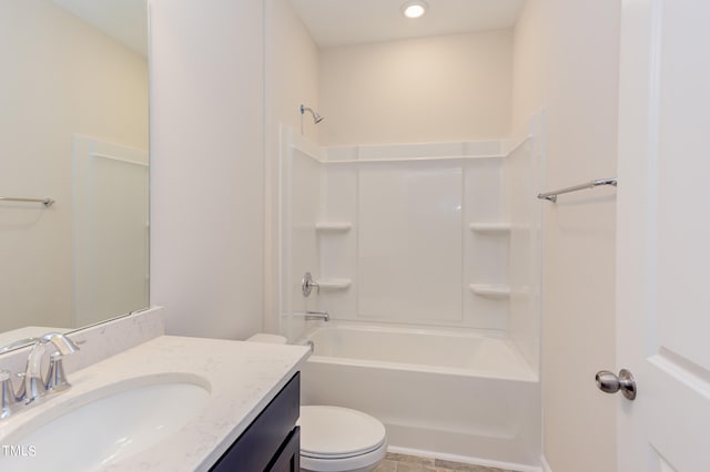 full bathroom featuring vanity, bathing tub / shower combination, and toilet