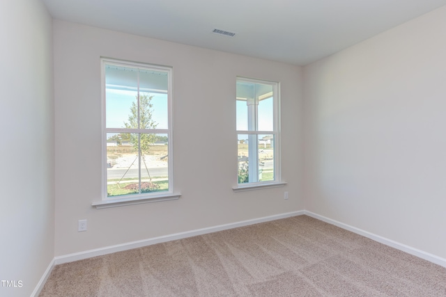 view of carpeted spare room