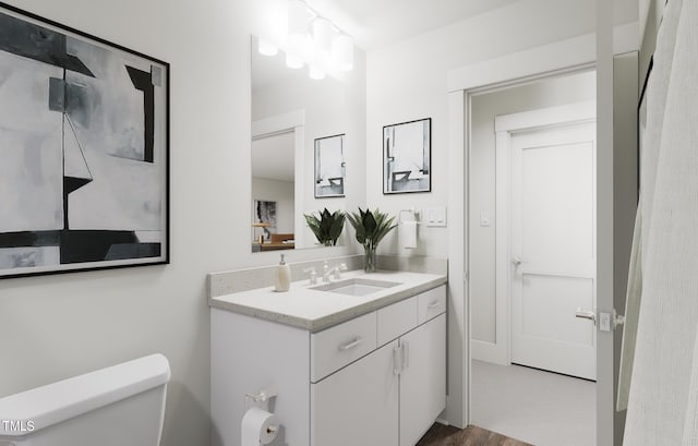 bathroom with vanity and toilet