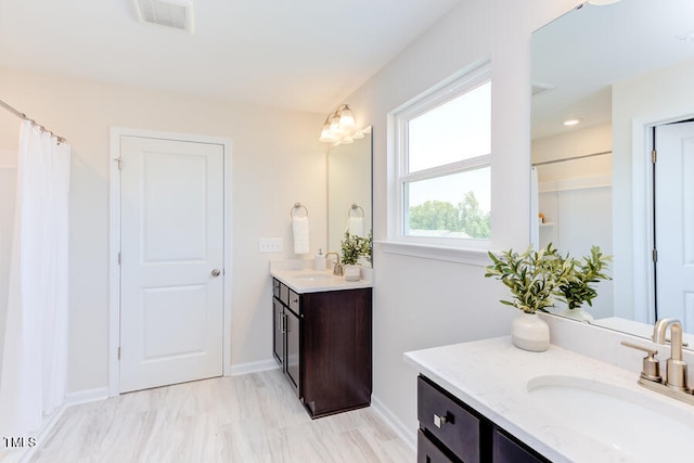 bathroom featuring vanity and a shower with curtain