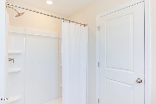 bathroom featuring a shower with curtain