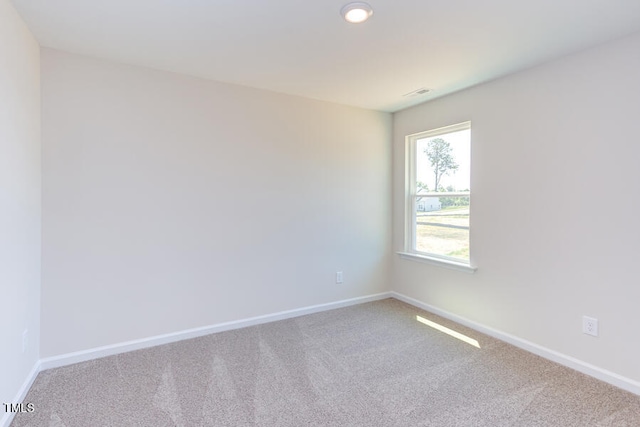 view of carpeted spare room