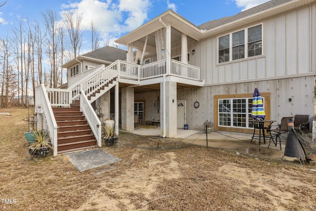 rear view of property with a patio area