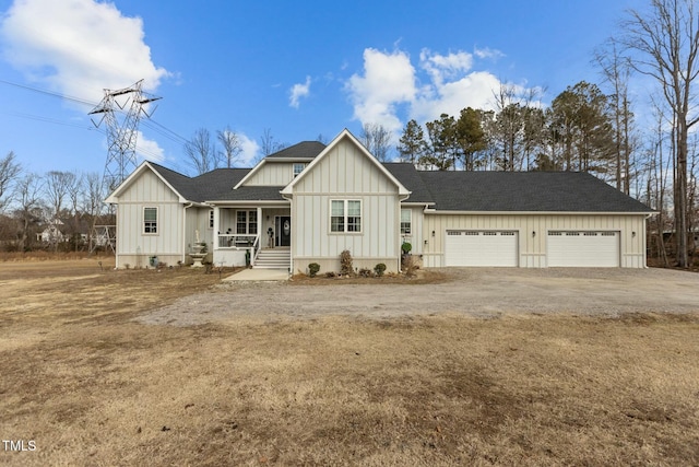 view of front of home with a garage and covered porch