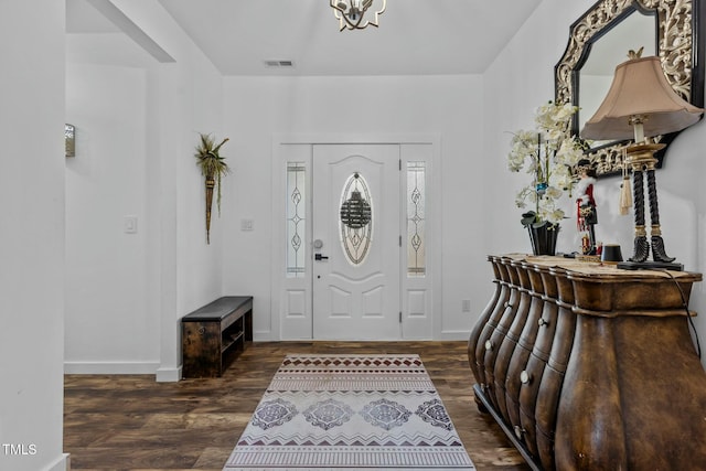 foyer entrance featuring dark hardwood / wood-style flooring