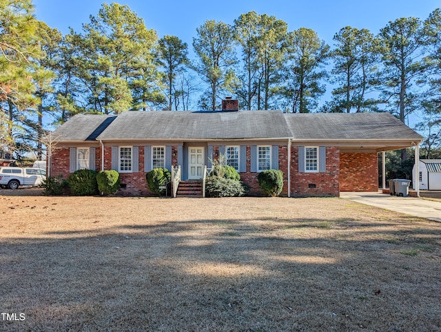 single story home featuring a carport