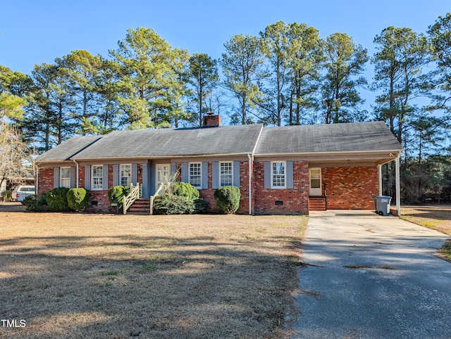 single story home featuring a carport and a front lawn