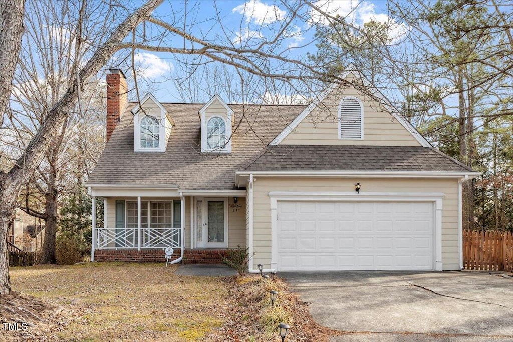 cape cod home with covered porch