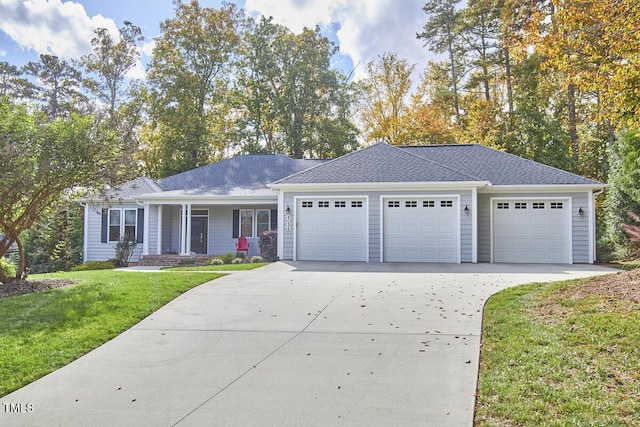 ranch-style house with a garage and a front yard