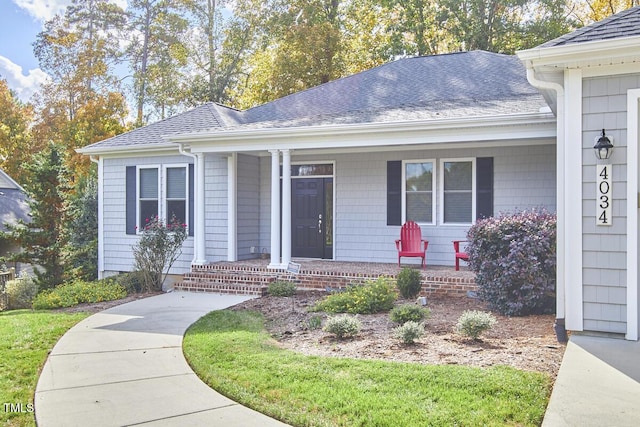 single story home with covered porch