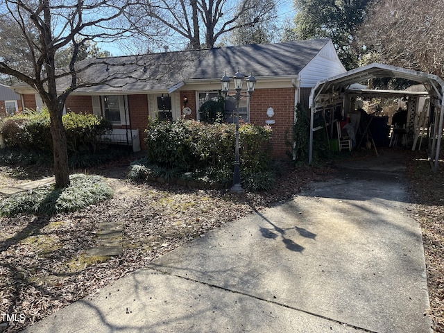 single story home with a carport