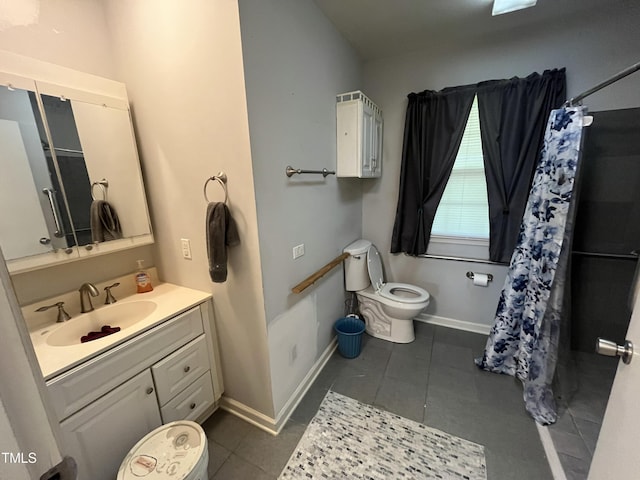 2612 Academy St, Sanford, NC 27332 - bathroom featuring toilet, vanity, tile patterned floors, and a shower with curtain
