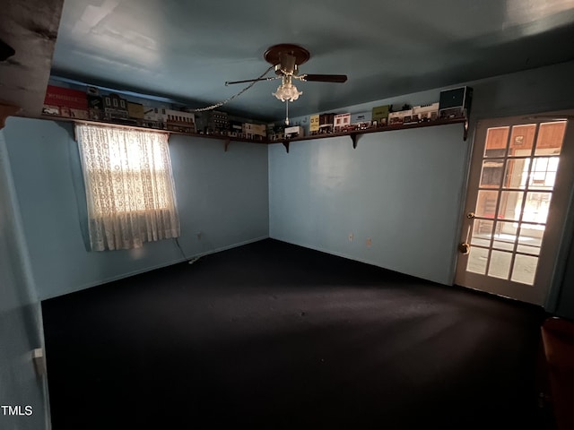 2612 Academy St, Sanford, NC 27332 - empty room featuring healthy amount of natural light, a ceiling fan, and carpet