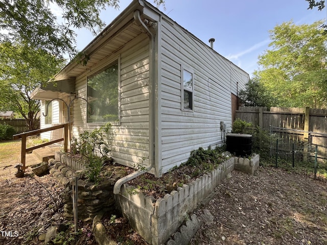 2612 Academy St, Sanford, NC 27332 - view of side of home with cooling unit