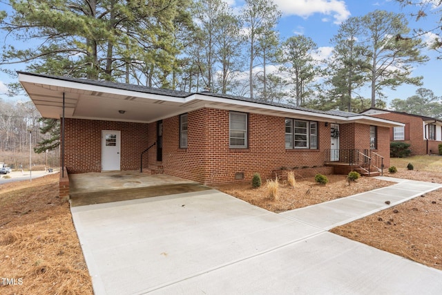 single story home featuring a carport