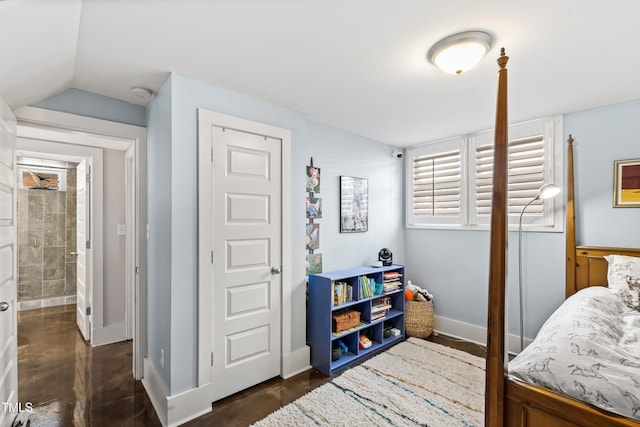 bedroom with vaulted ceiling