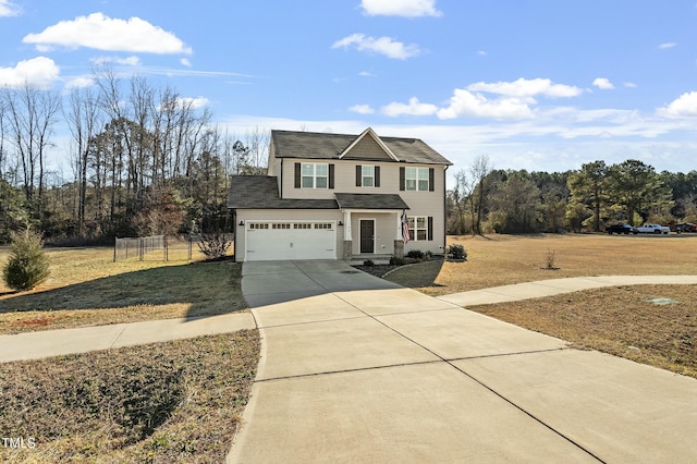 view of front of property featuring a garage and a front lawn