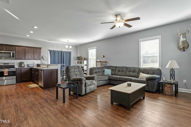 105 Langdon Chase Way, Selma, NC 27576 - living area featuring recessed lighting, dark wood-type flooring, a healthy amount of sunlight, and ceiling fan