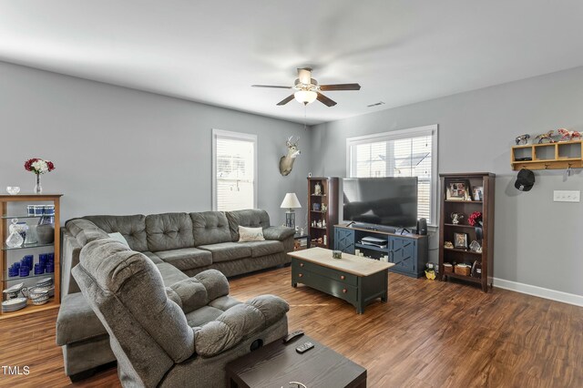 105 Langdon Chase Way, Selma, NC 27576 - living room featuring visible vents, dark wood-type flooring, baseboards, and ceiling fan